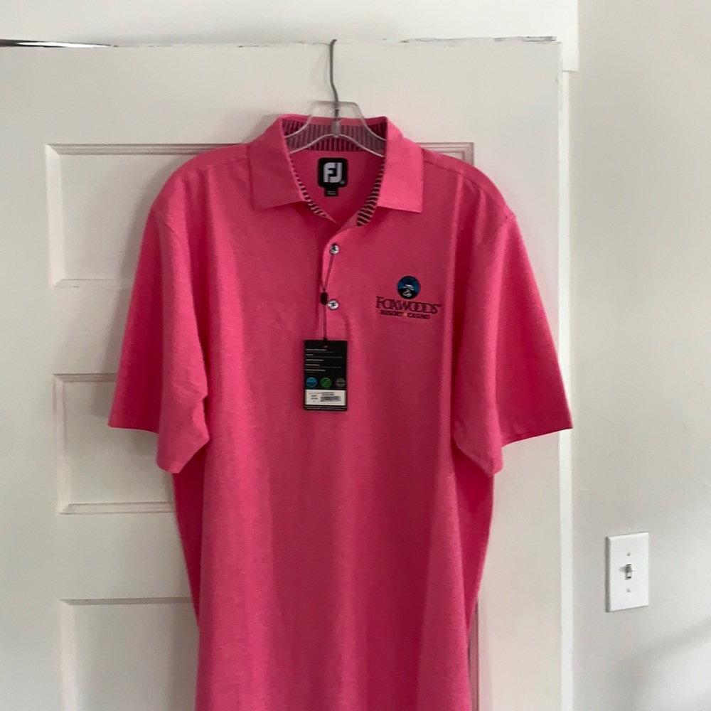 New with tags Pink Foot Joy Golf shirt (Foxwoods logo) (M).